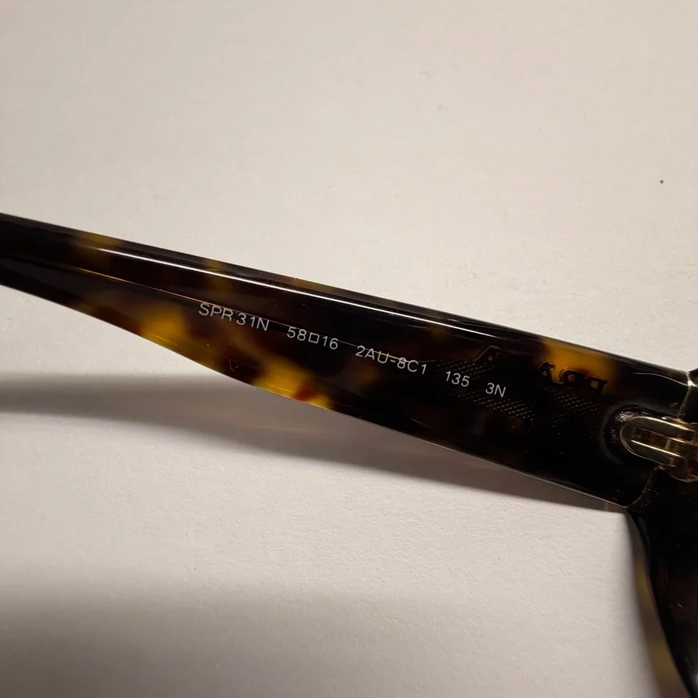 Prada sunglasses feature